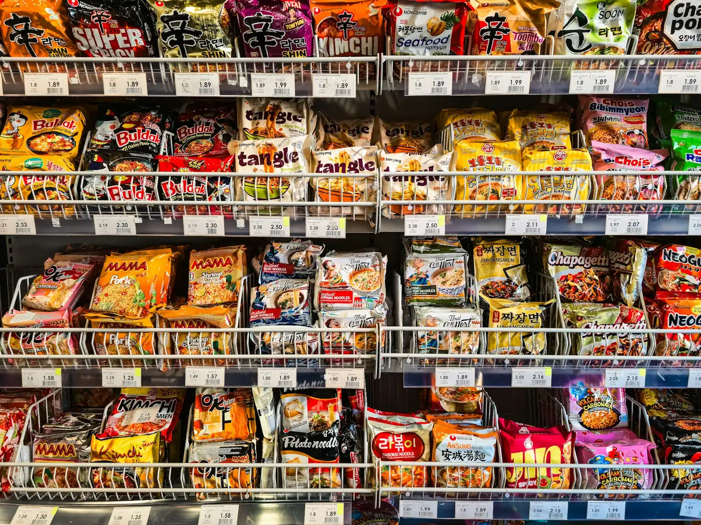 Shelves full of instant noodle packets in a Japanese shop