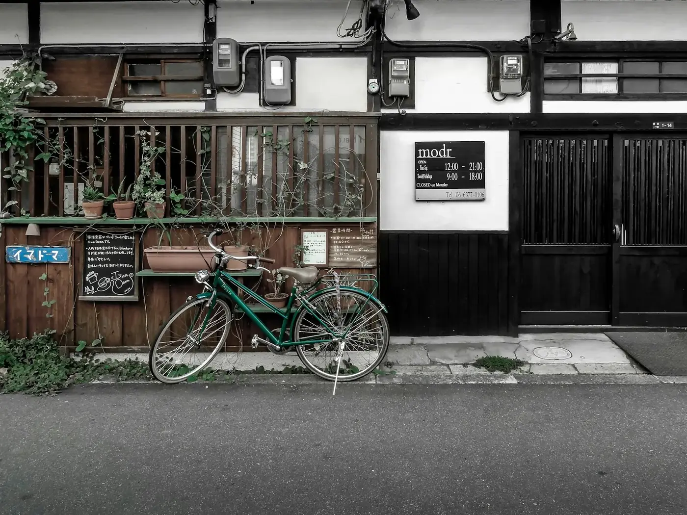 A bicycle parked on an old Japanese street